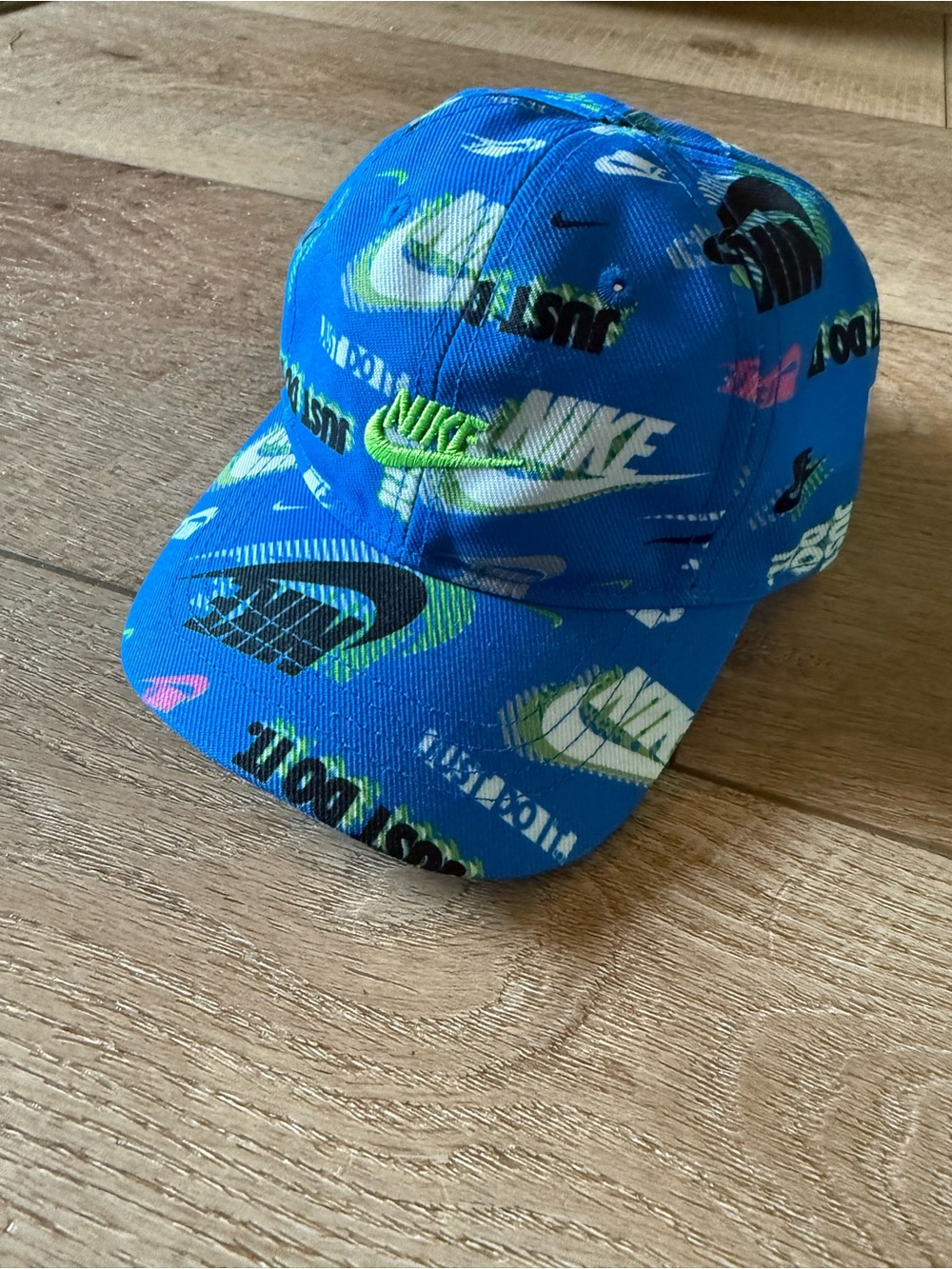 NWOT Nike Infant Blue Graphic Logo Baseball Cap with Neon Green Swoosh
